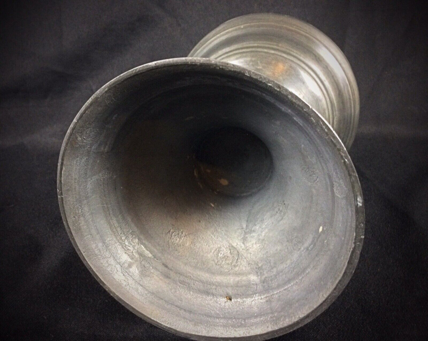 Close-up of vintage pewter oil lamp
