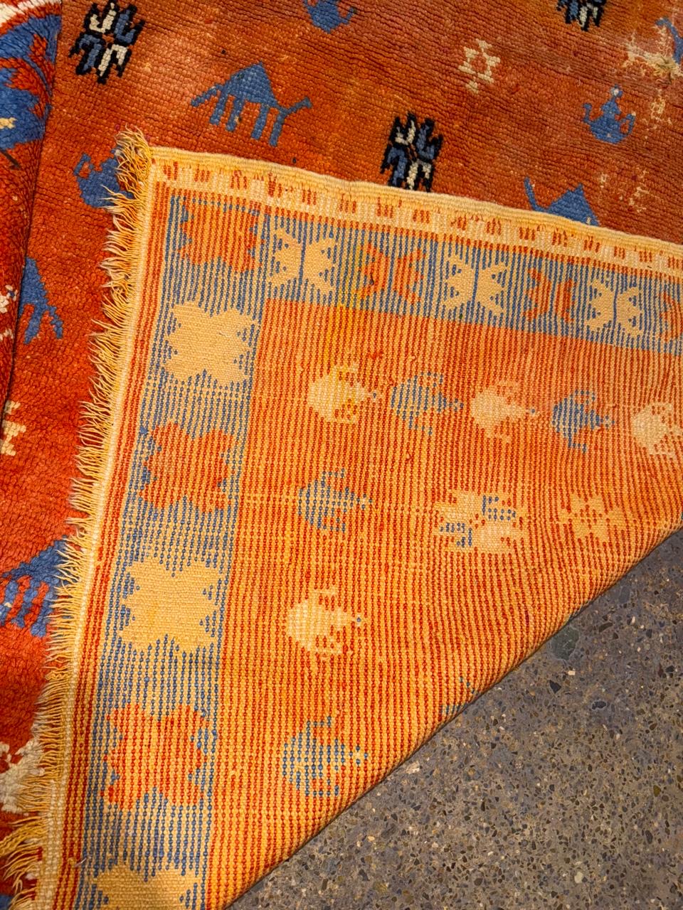 deep blue border framing central tribal design