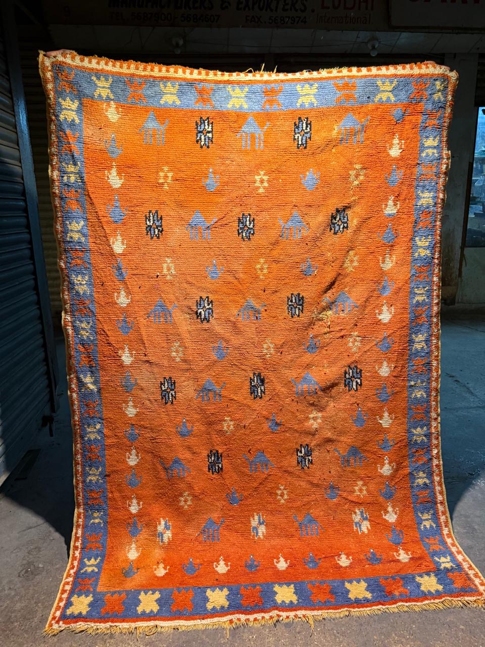 1910s Berber tribal rug with bold geometric border