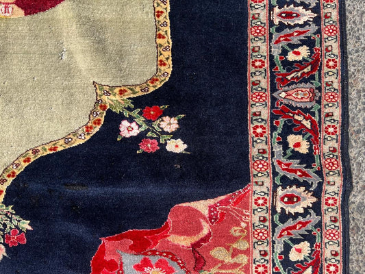 Close-up of silk highlights catching light on floral motif