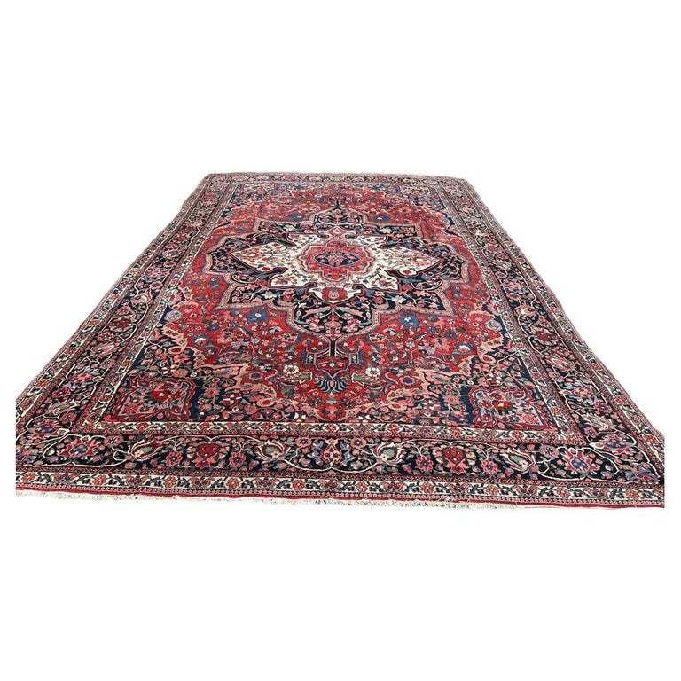 Handmade Antique Persian Bakhtiari Rug showcasing its regal red color palette and