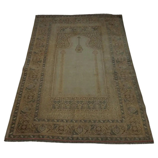 Handmade antique Turkish Transilvania prayer rug featuring intricate motifs and muted earthy tones from the 1880s