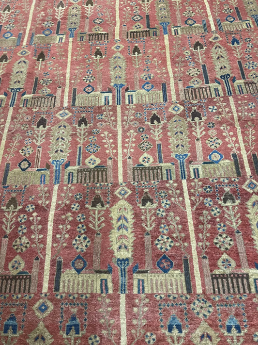 Close-up of the intricate traditional Persian patterns on the palace-sized rug