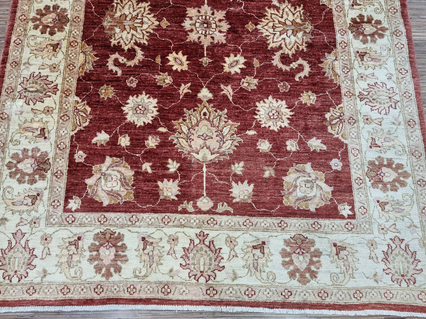 Close-up of complex border patterns on Handmade Vintage Afghan Zigler Rug - Detailed view showcasing the intricate patterns in the rug's borders.
