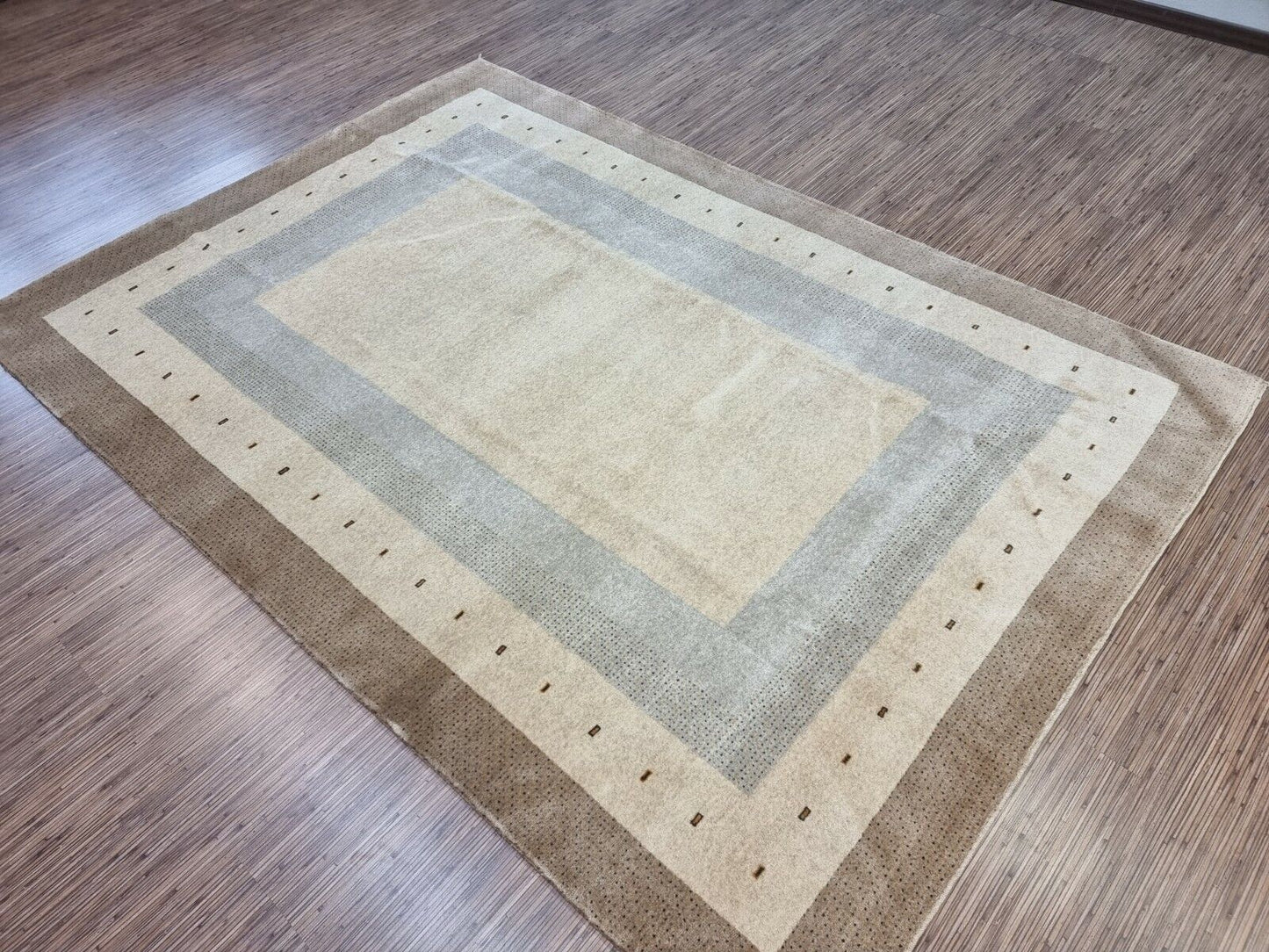 Detailed close-up of the thick woolen texture inviting touch on the Handmade Vintage Persian Style Gabbeh Rug