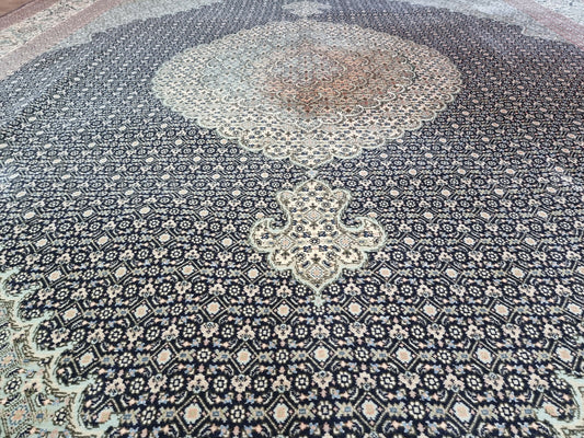 Back view of the vintage Persian Tabriz rug showcasing its craftsmanship and size