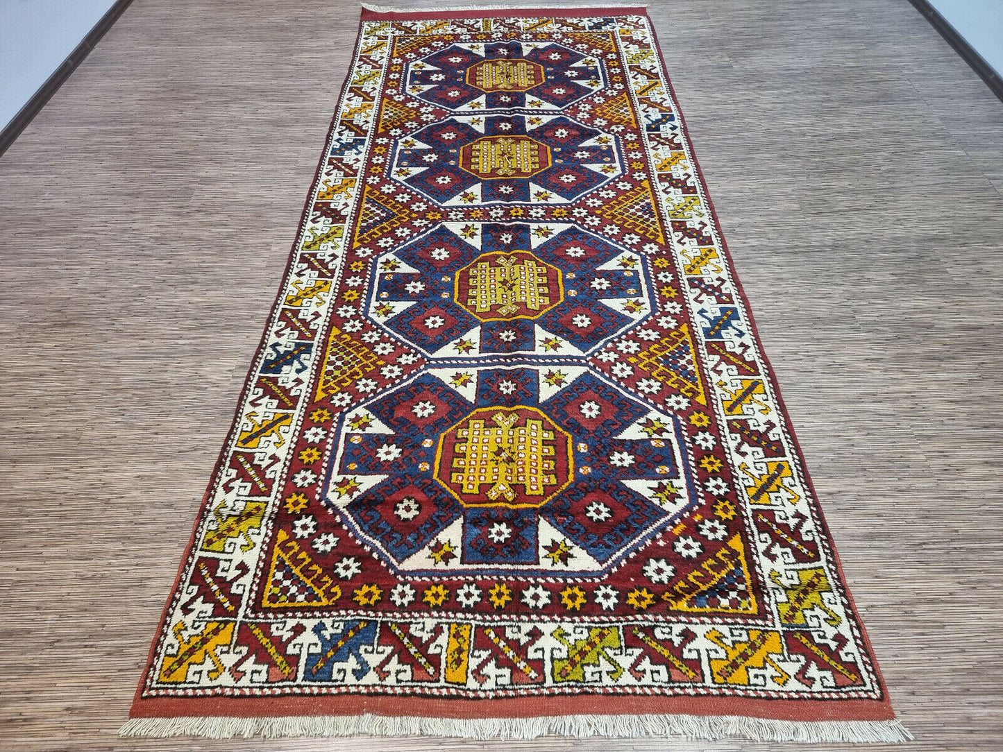 Detailed close-up of the complex geometric patterns on the Handmade Antique Turkish Anatolian Runner Rug