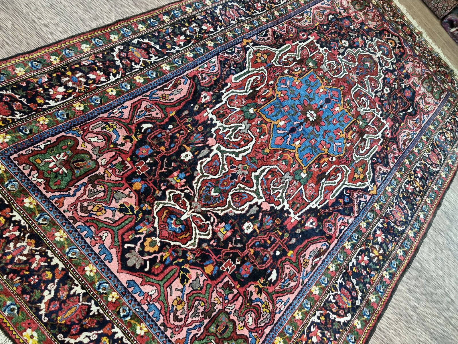 Close-up of Persian artistry on Handmade Antique Persian Bakhtiari Rug - Detailed view showcasing the artistic mastery and craftsmanship characteristic of Persian rugs.