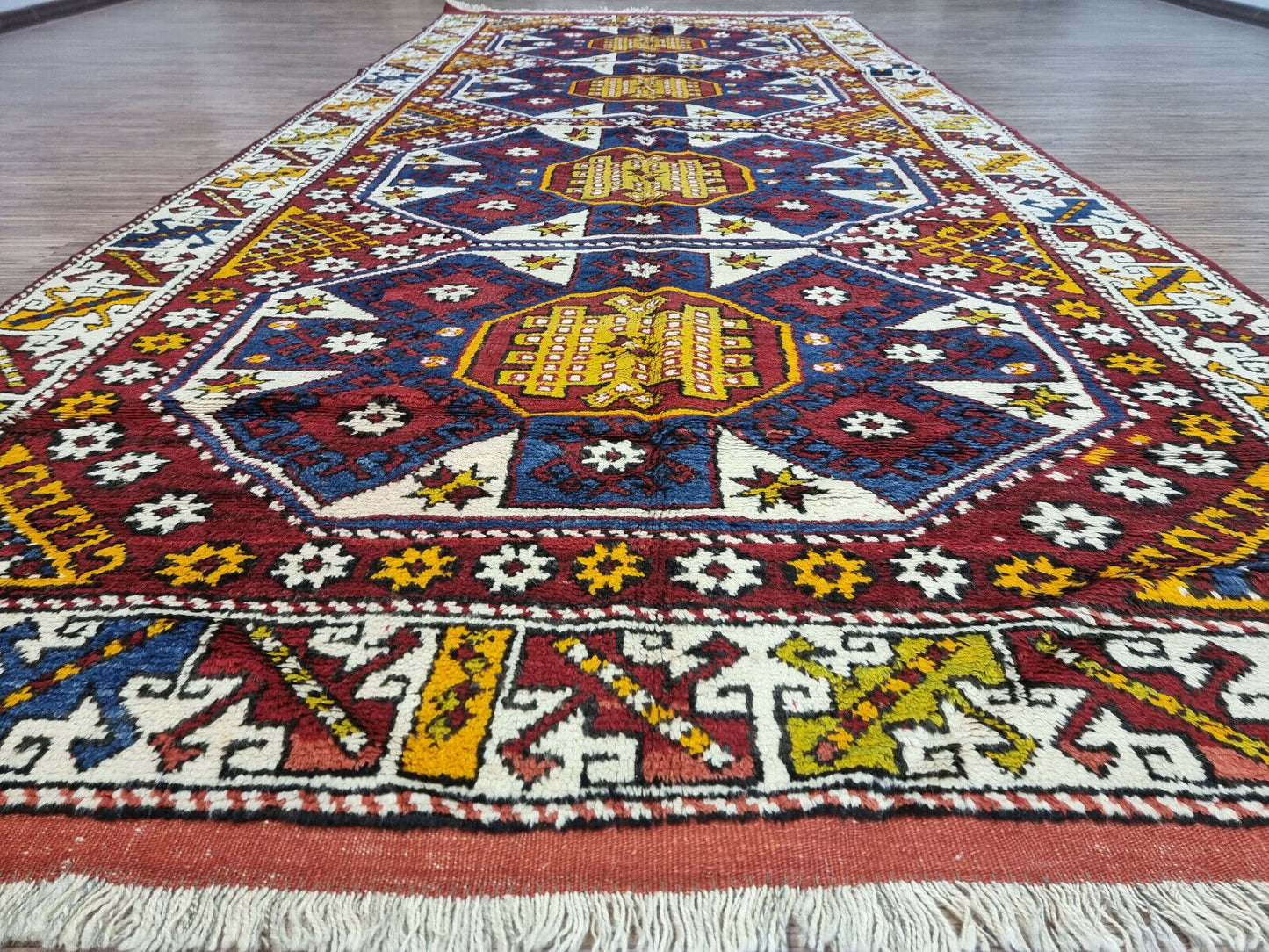 Angled shot of the Handmade Antique Turkish Anatolian Runner Rug complementing hallway decor