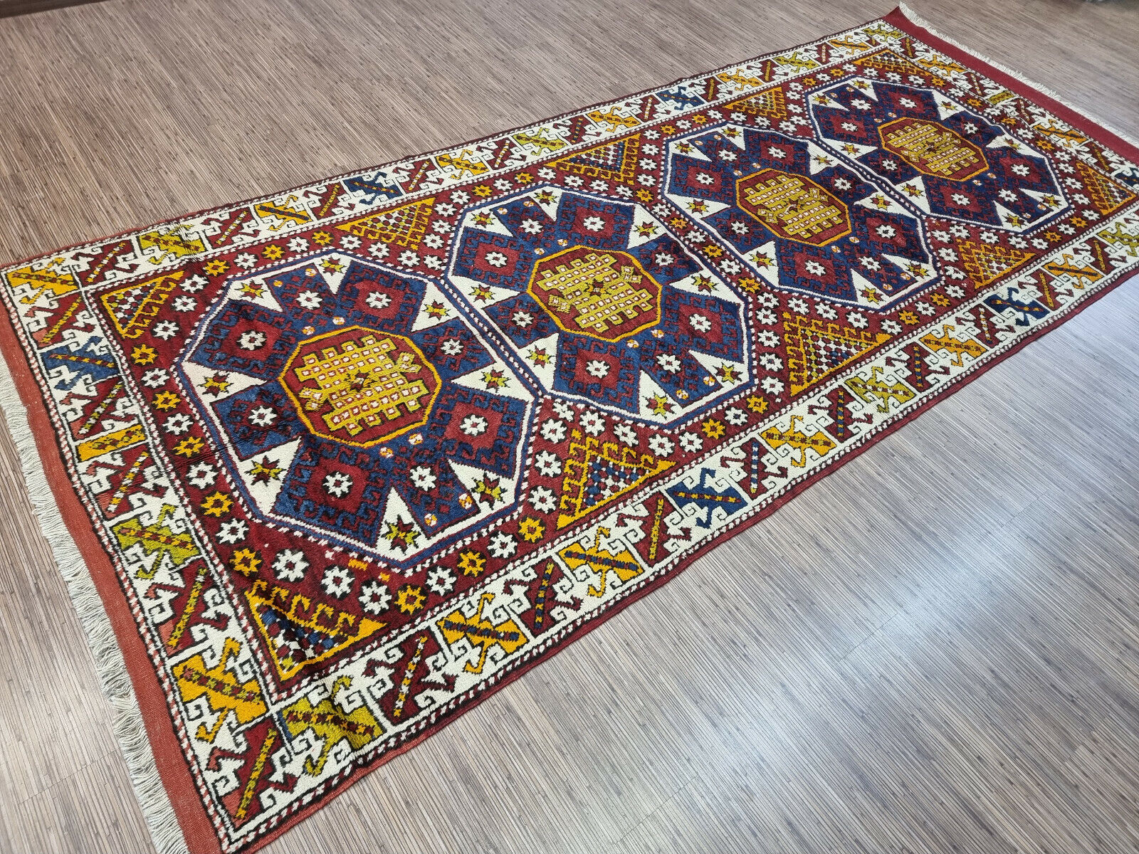 Front view of the Handmade Antique Turkish Anatolian Runner Rug highlighting its intricate designs