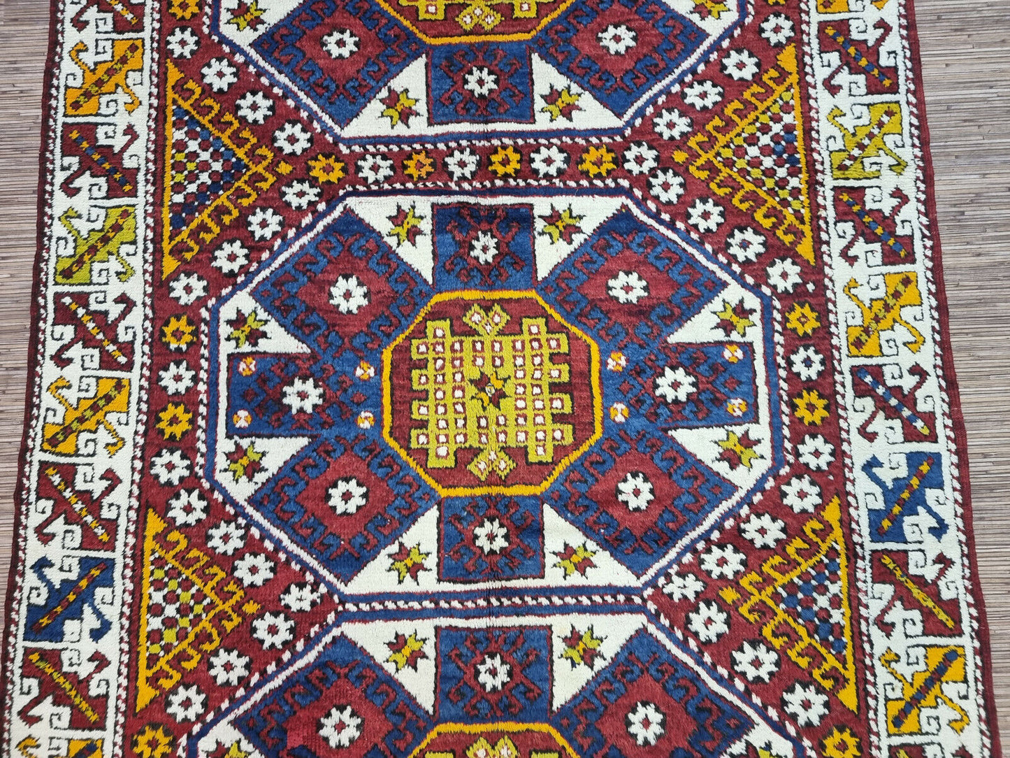 Detailed shot of the fringe at one end of the Handmade Antique Turkish Anatolian Runner Rug