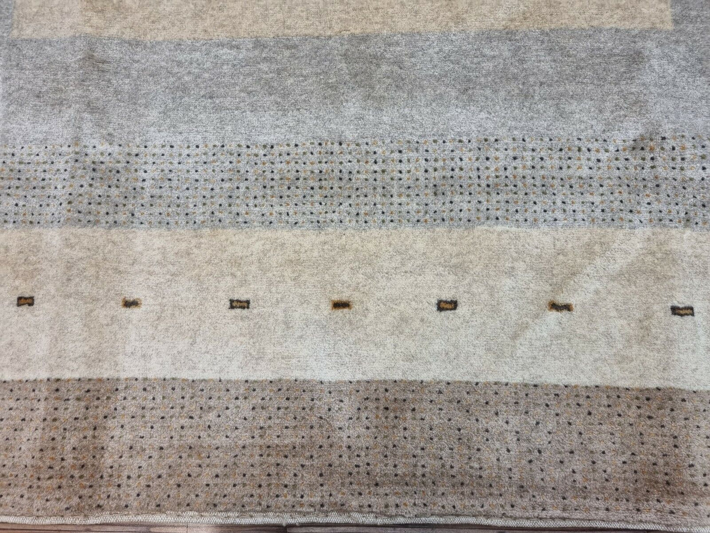 Overhead shot of the Handmade Vintage Persian Style Gabbeh Rug displaying size and dimensions