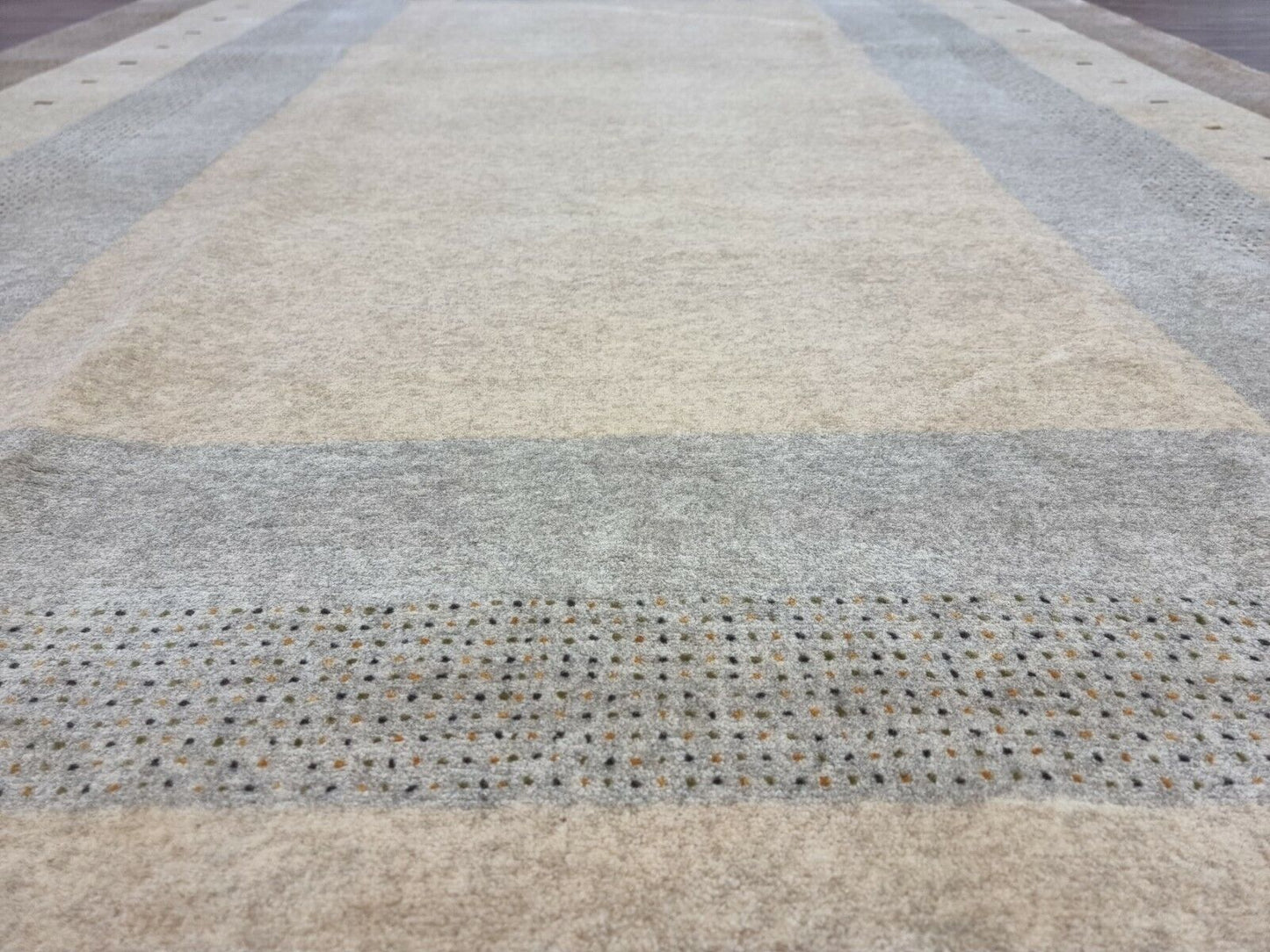 Side view of the Handmade Vintage Persian Style Gabbeh Rug demonstrating its thick woolen texture