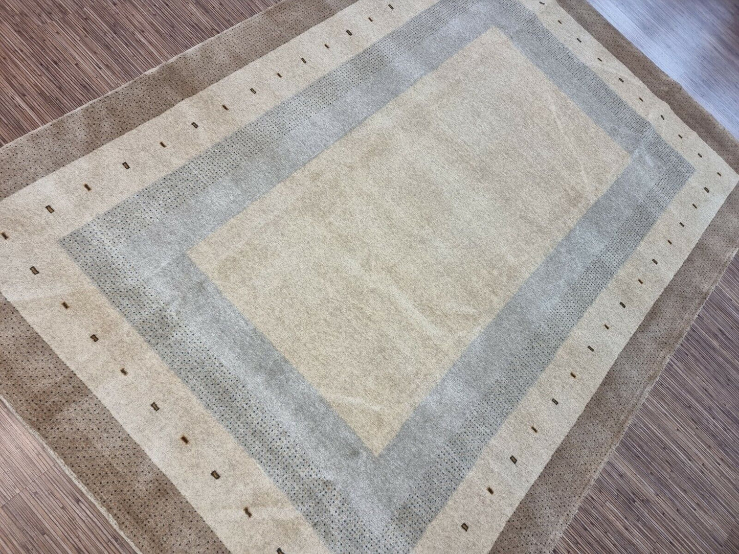 Side angle shot of the Handmade Vintage Persian Style Gabbeh Rug showcasing size and scale