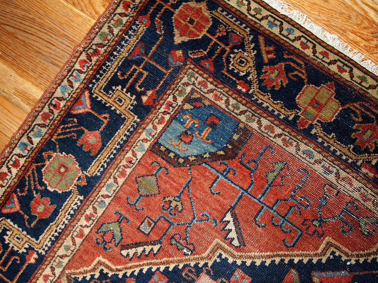 Antique handmade Malayer rug in navy blue and red shades. This rug is in original good condition.