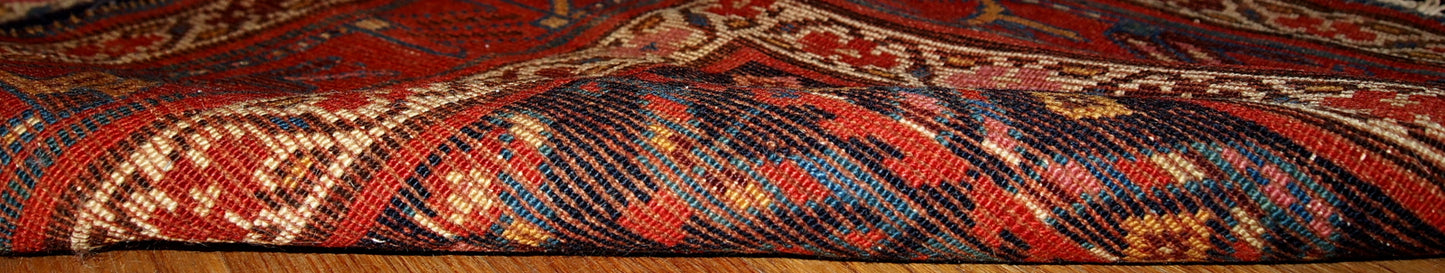 Handmade antique Persian Kurdish distressed runner 1900s