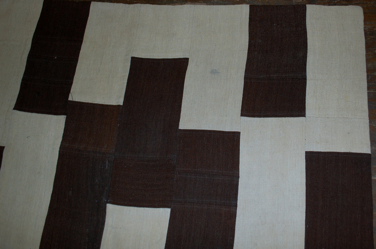 Handmade vintage Turkish kilim Patchwork in original good condition from the end of 20th century. This kilim made in white and chocolate brown wool.