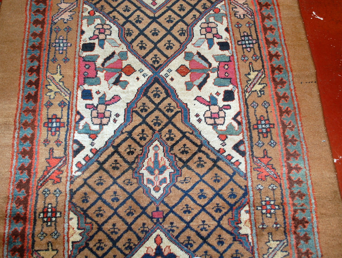 Handmade antique Camel Hair runner in original good condition from the end of 19th century. This runner is wide and 15 feet long.
