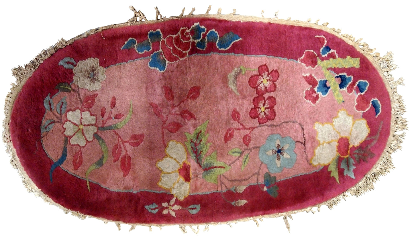 Oval Art Deco Chinese rug in original good condition. the rug is made in wool, quite thick and soft.