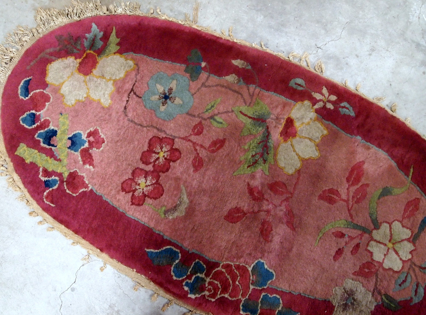 Oval Art Deco Chinese rug in original good condition. the rug is made in wool, quite thick and soft.