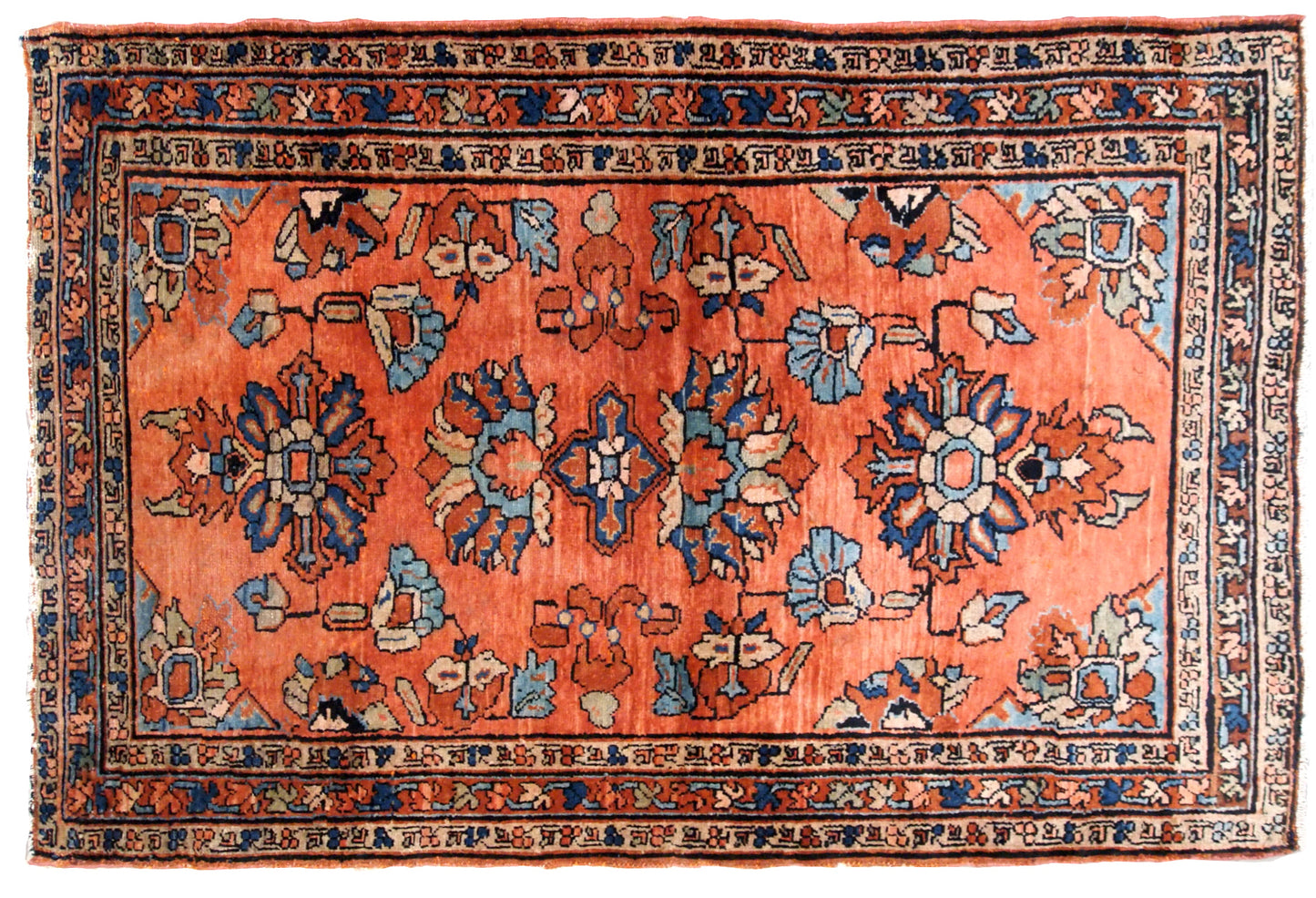 Antique hand made Persian Lilihan rug in original good condition. The rug is from the beginning of 20th century, in red shade.