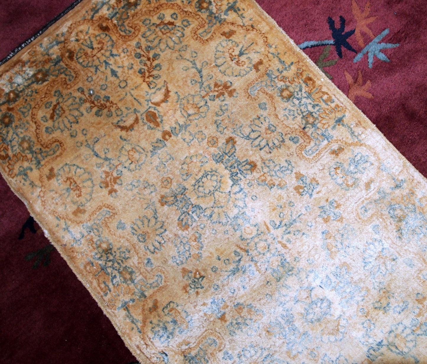 Hand made antique Persian Kerman rug in beige and sky blue shades. The rug is from the beginning of 20th century in original good condition.