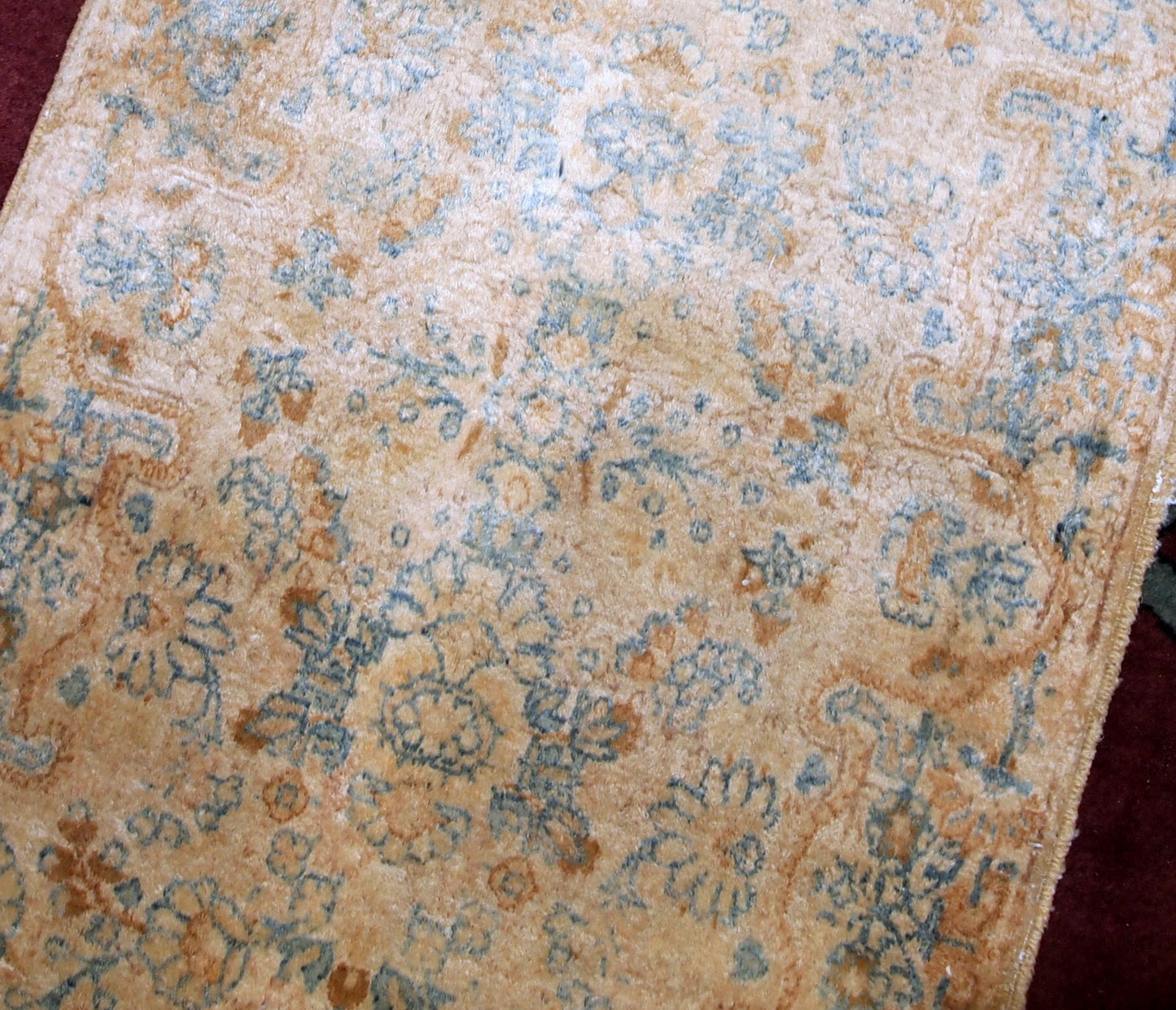 Hand made antique Persian Kerman rug in beige and sky blue shades. The rug is from the beginning of 20th century in original good condition.