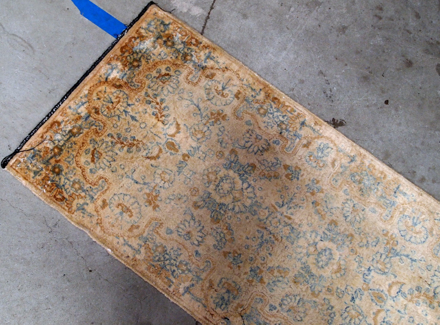Hand made antique Persian Kerman rug in beige and sky blue shades. The rug is from the beginning of 20th century in original good condition.