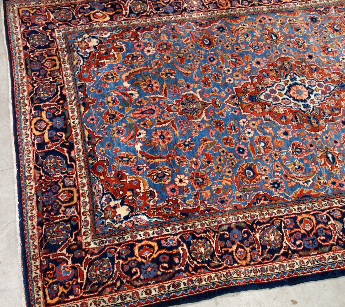 Antique Persian hand made Kashan rug in sky blue color. The rug is in original good condition from the beginning of 20th century.