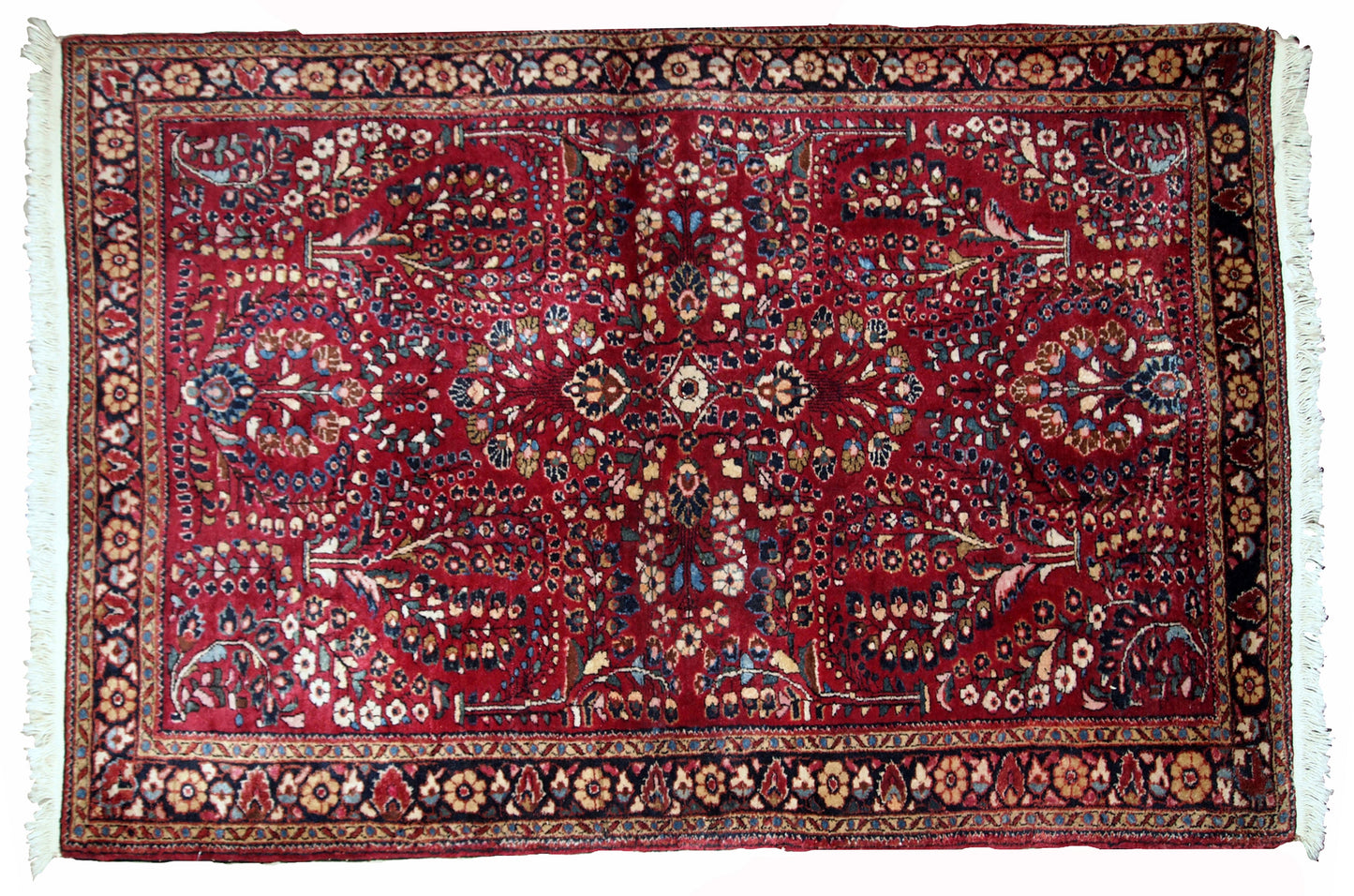 Handmade antique Sarouk rug in bright red colour. The rug is in original good condition from the beginning of 20th century.