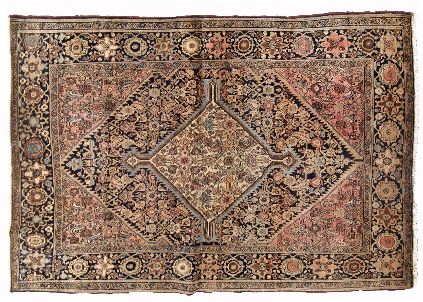 Handmade antique Sarouk Farahan rug from the end of 19th century. The rug is in original good condition made in light shades of beige and pink.
