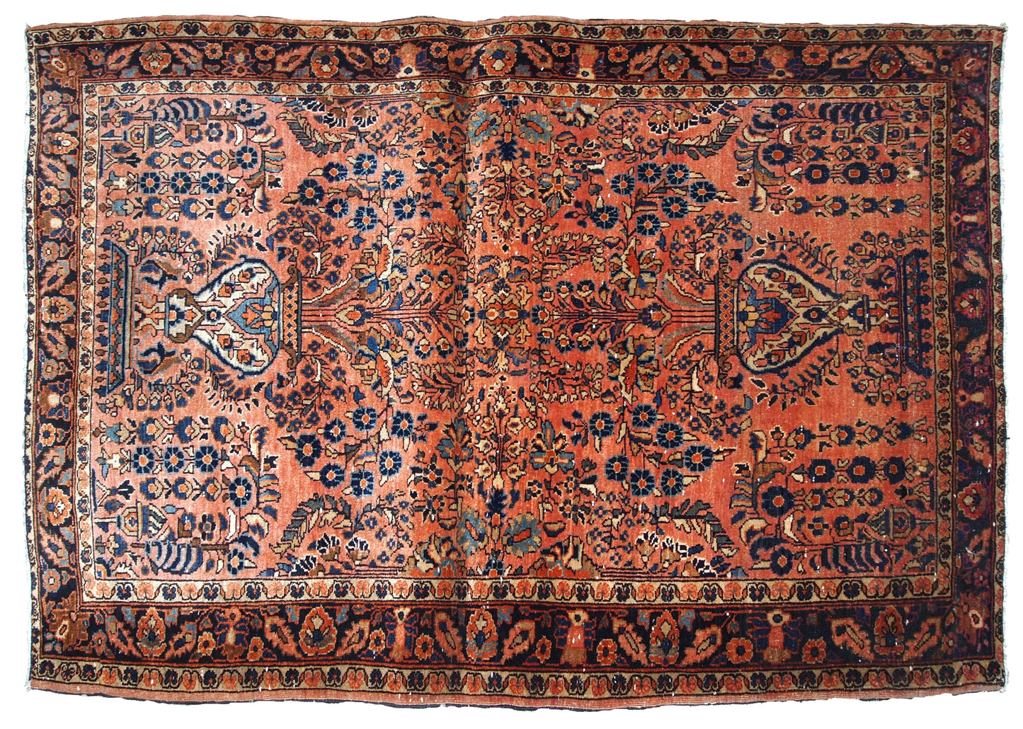 Hand-weaved antique Sarouk rug from the beginning of 20th century. The rug is in original good condition.