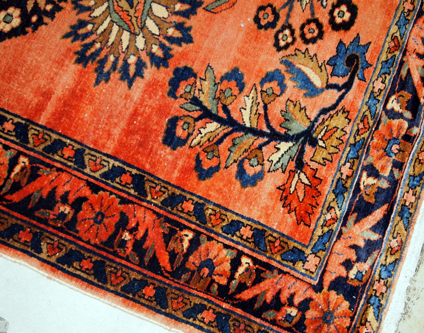 Antique hand-woven Lilihan rug in navy blue, white and red colors. This rug is from the beginning of 20th century in original good condition.