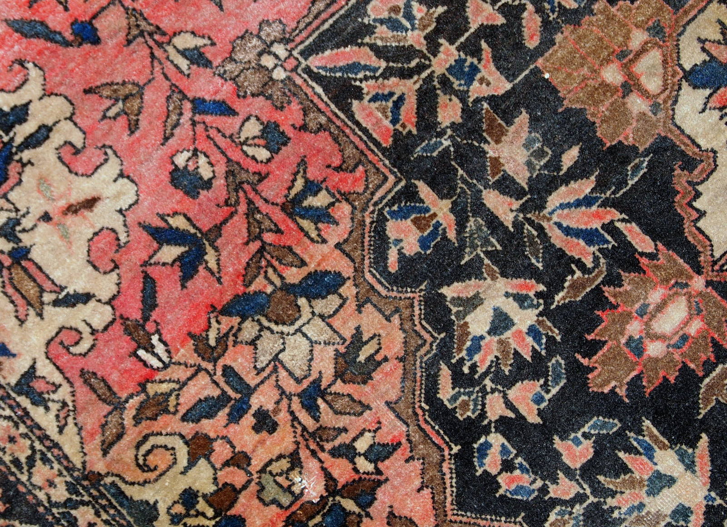Handmade antique Persian Sarouk Farahan rug in original good condition. The rug is from the end of 19th century made in wool.