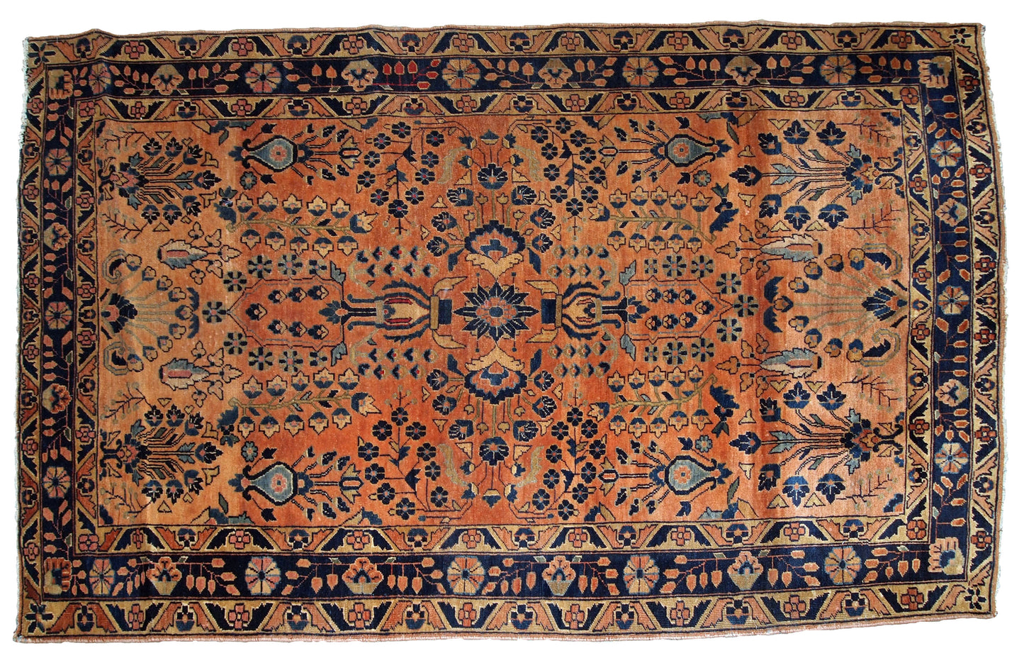 Handmade antique Sarouk rug in original good condition. The rug has been made in the beginning of 20th century in red wool.