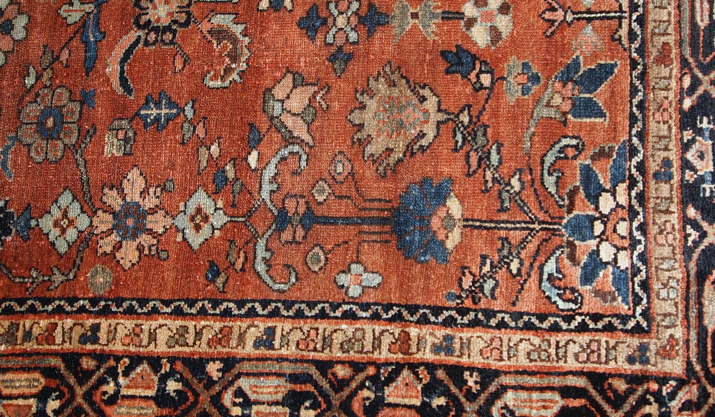 Hand made antique Hamadan rug from the beginning of 20th century. The rug is in red wool and in original good condition.