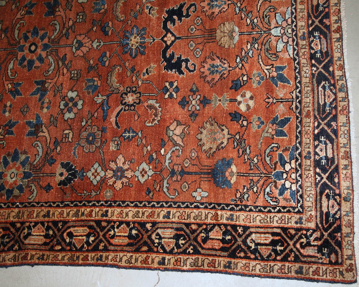 Hand made antique Hamadan rug from the beginning of 20th century. The rug is in red wool and in original good condition.