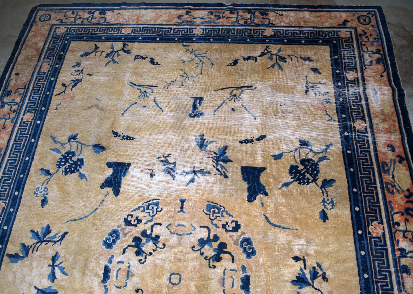 Handmade antique collectible Chinese Ningxia rug in yellow shade. The rug is in original condition, has age wears.