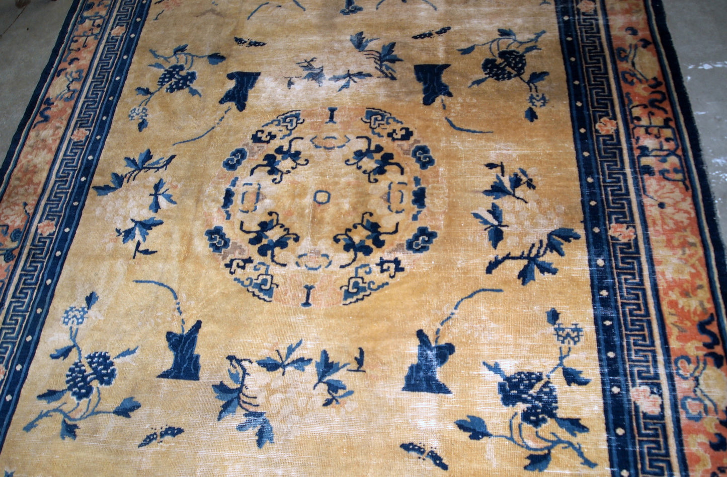 Handmade antique collectible Chinese Ningxia rug in yellow shade. The rug is in original condition, has age wears.
