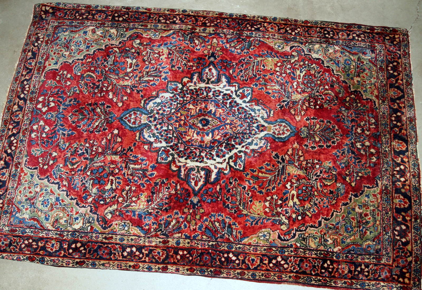 Handmade antique Persian Sarouk rug, 1920s