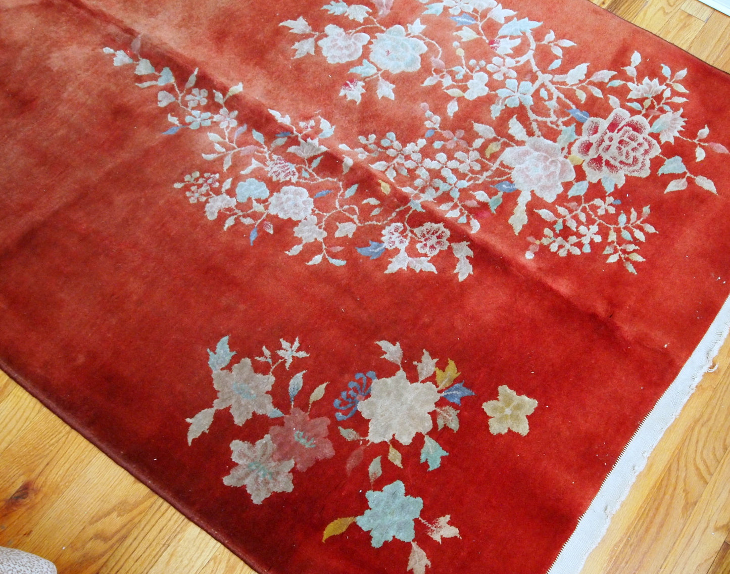 Handmade antique Art Deco Chinese rug in bright orange color. The rug is in original good condition, made in the beginning of 20th century.
