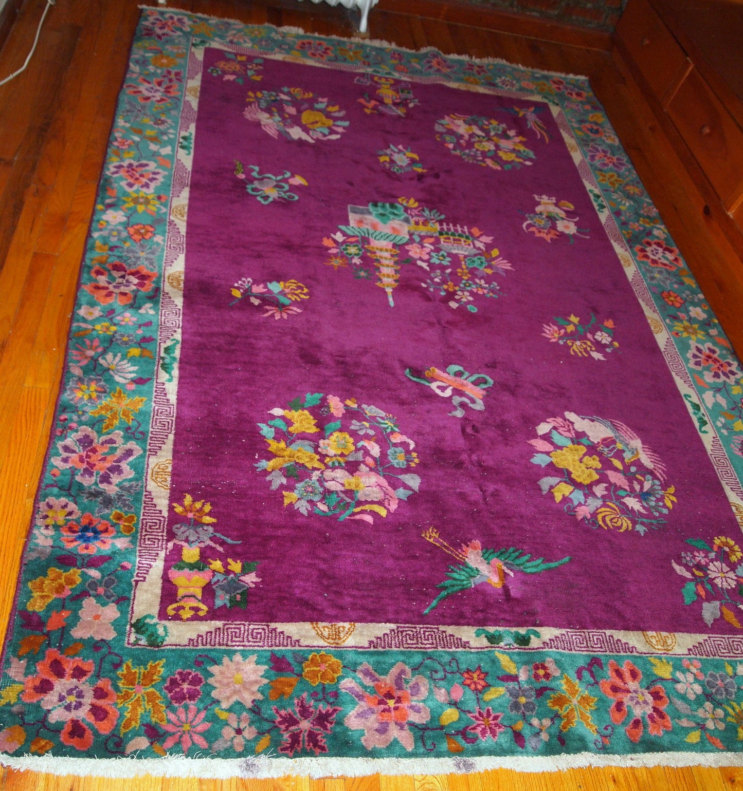 Handmade antique Art Deco Chinese rug in original good condition, the rug is from the beginning of 20th century.