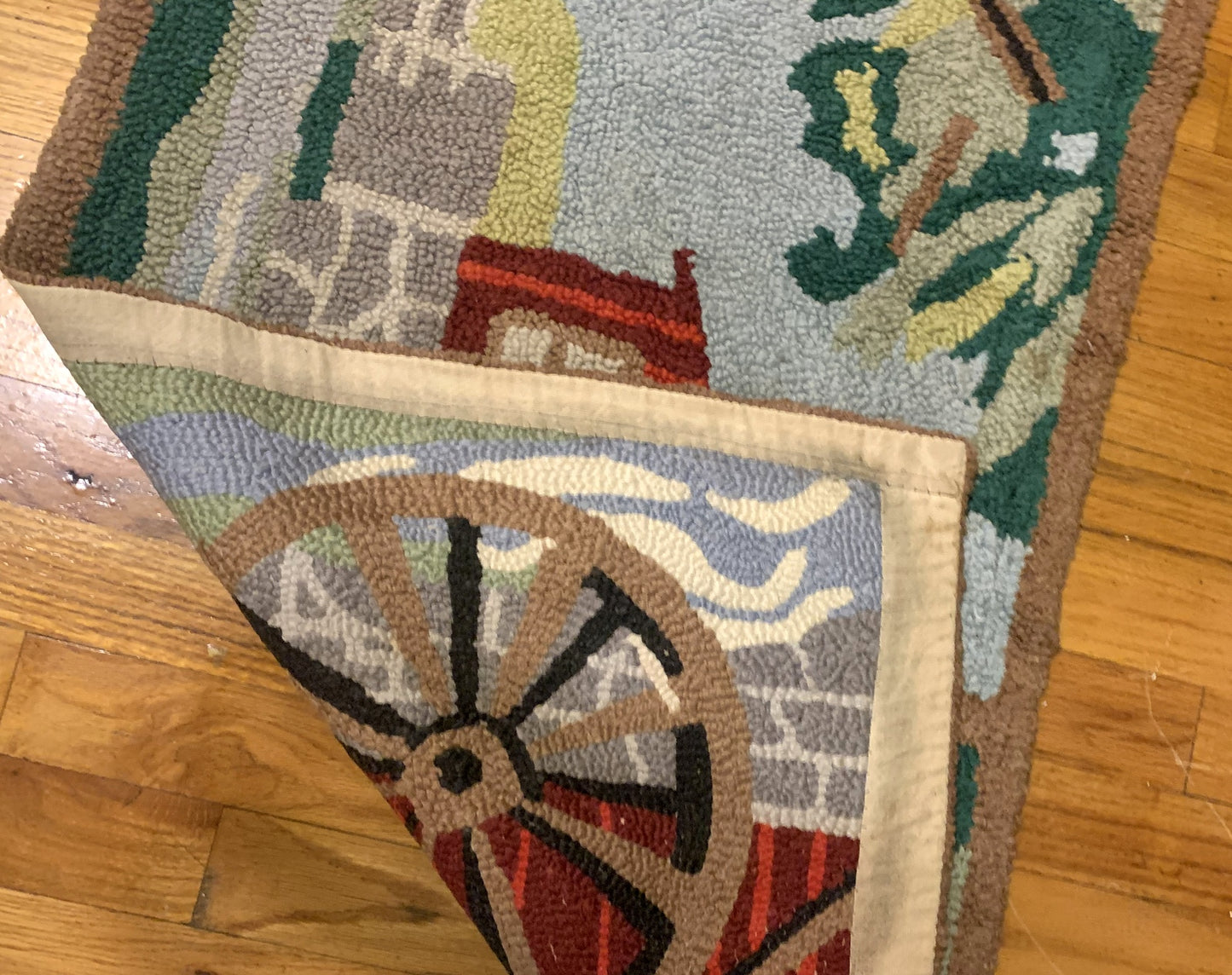 Handmade antique American Hooked rug in colorful shades. The rug is from the beginning of 20th century in original good condition.