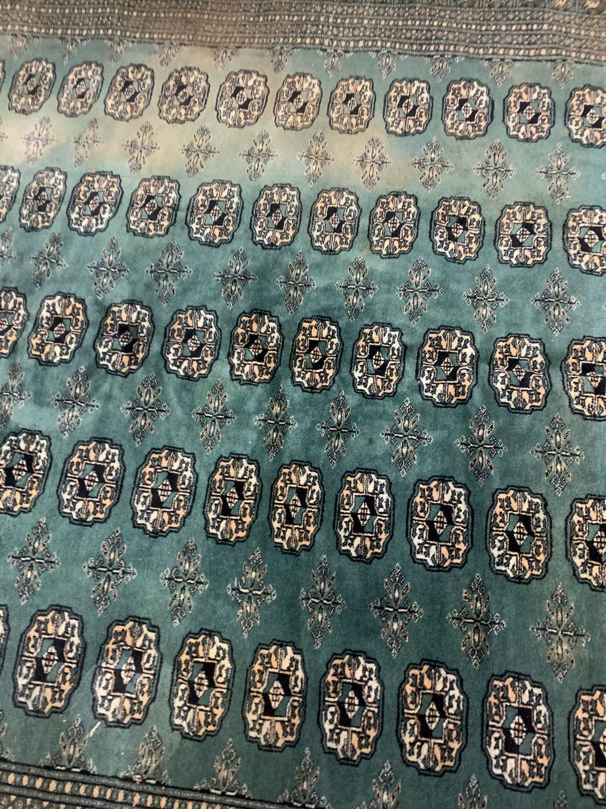 Handmade vintage Uzbek Bukhara rug 1970s