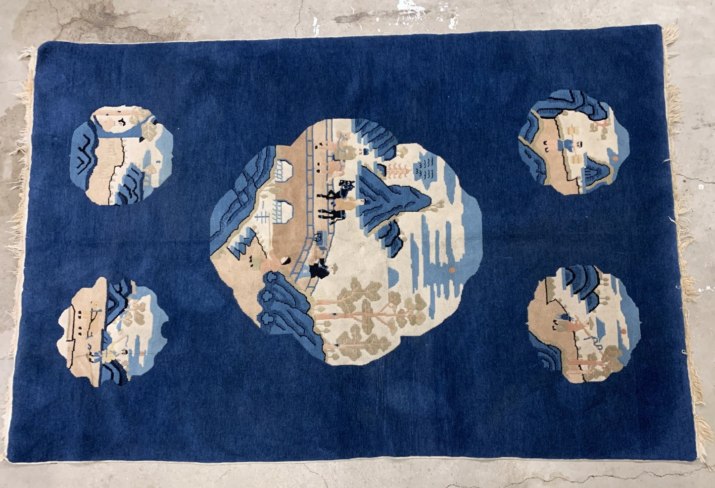 Handmade antique Peking Chinese rug in blue color and pictorial design. The rug is from the beginning of 20th century in original good condition.