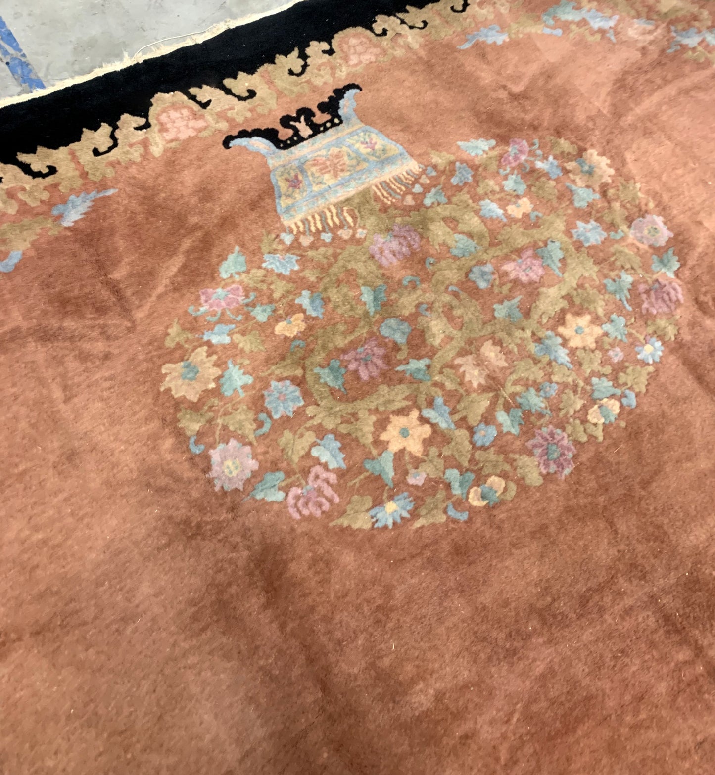 Handmade antique Art Deco Chinese rug in pink and black colors. The rug is from the beginning of 20th century in original condition, it has some low pile areas.