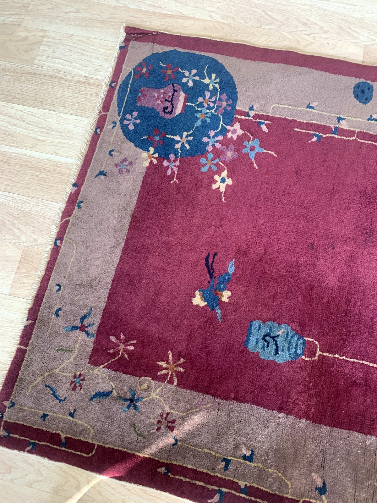 Detailed images of the vintage Chinese rug showcasing its intricate patterns, textures, and vintage character