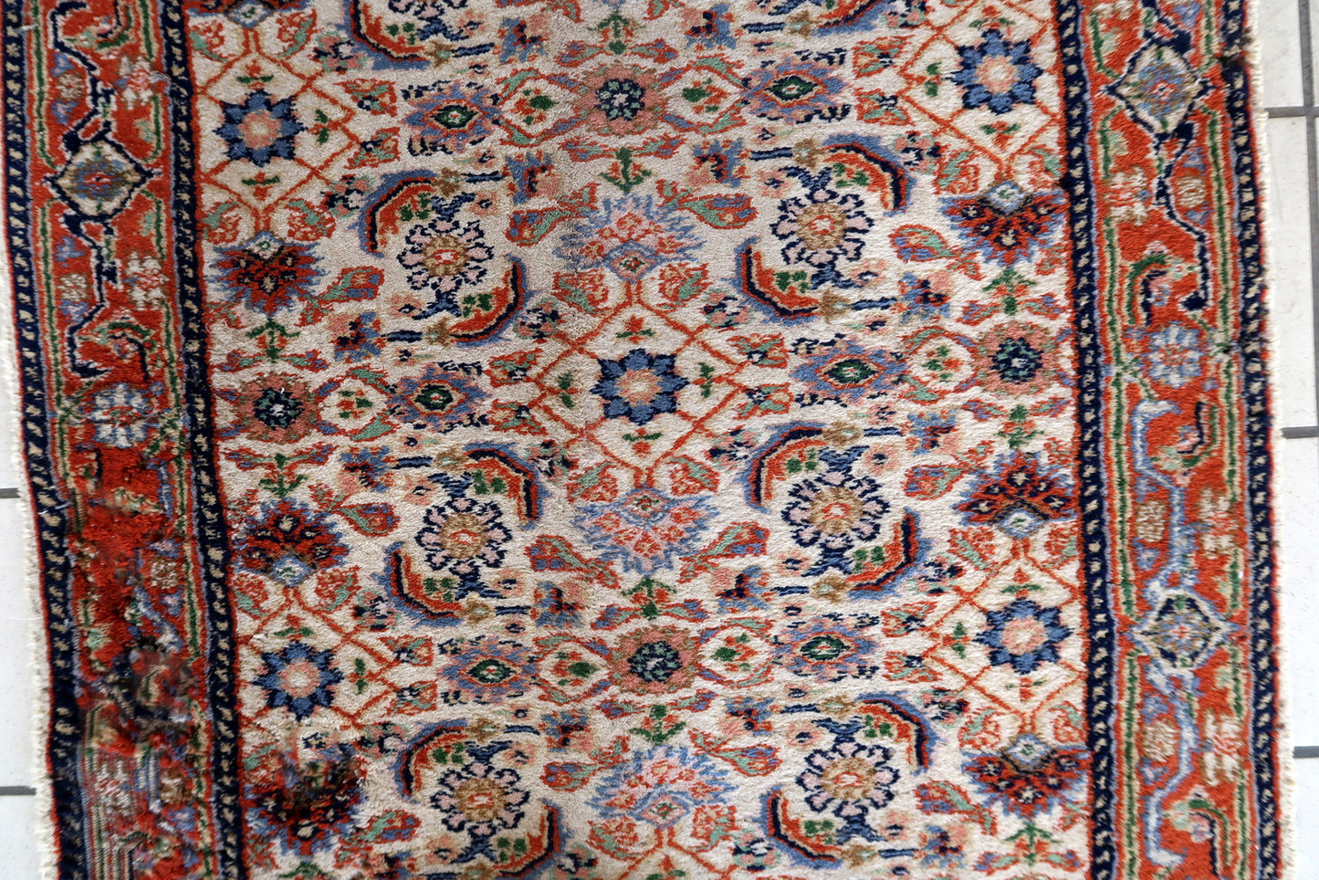 Handmade vintage Persian Mahal runner in all-over design. The runner is from the end of 20th century in good condition, it has some old restoration on one part of the border.