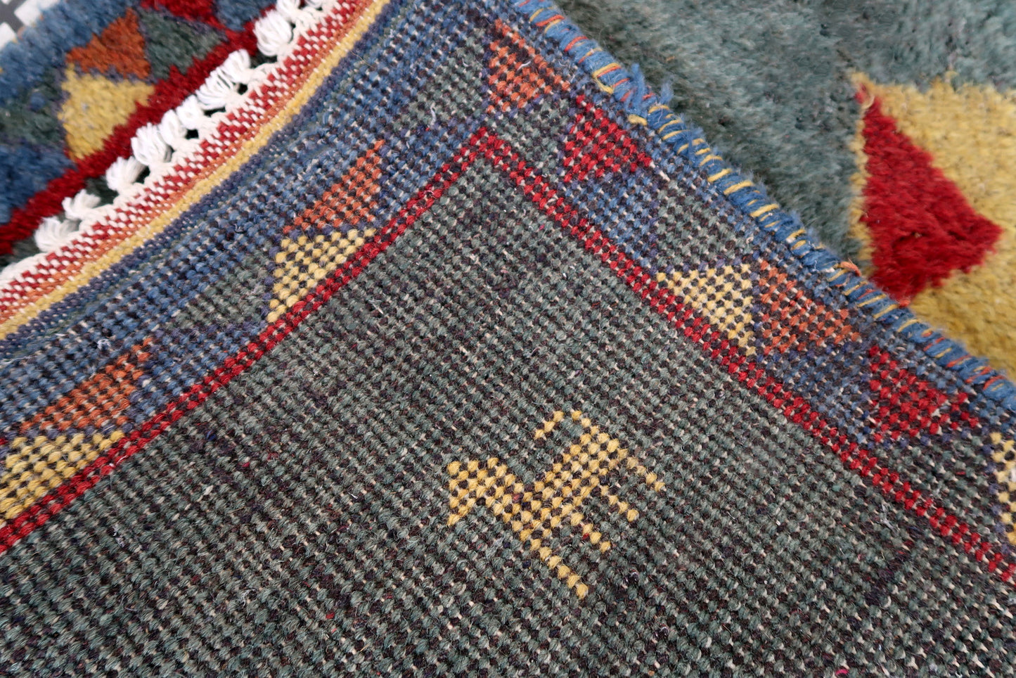 Handmade vintage Persian Gabbeh rug in sea green color. The rug is from the end of 20th century in original good condition.