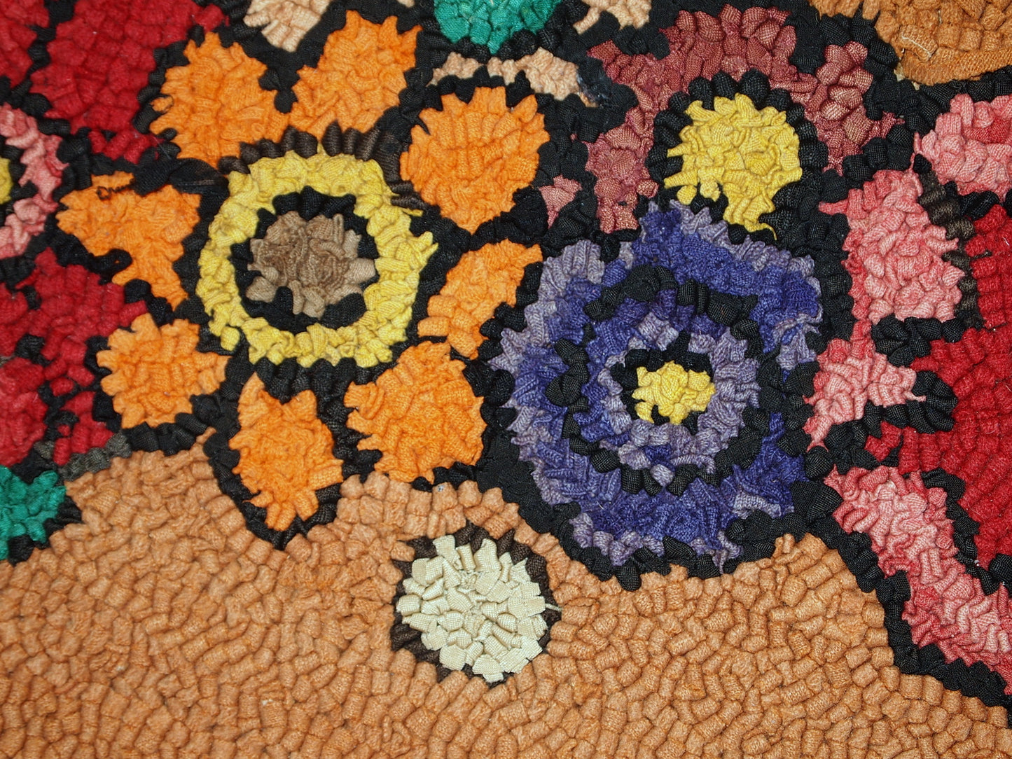 Rug backside detail showing the handcrafted quality of the American hooked rug